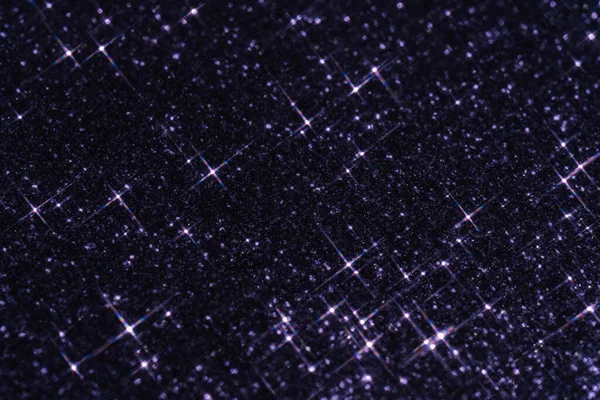 Abstract violet background with sparkles in the shape of stars. — Stock Photo, Image