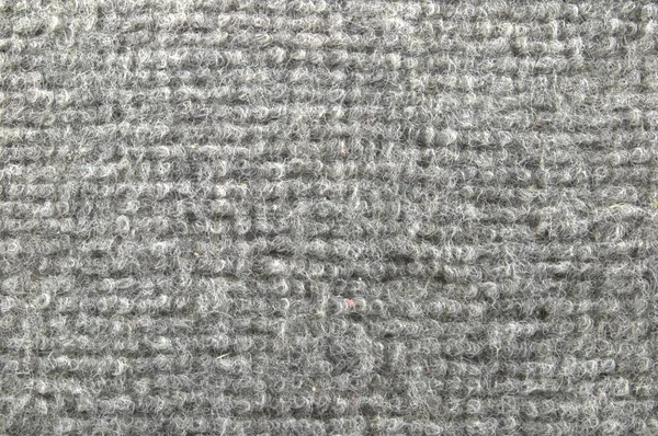 Soyutlama. Arka plan gri halıdan yapılmıştır..