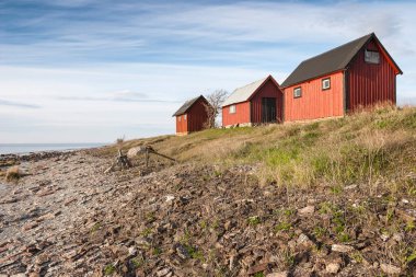 Gotland adasındaki bir balıkçı köyünün ahşap evleri, İsveç, İskandinavya, Avrupa