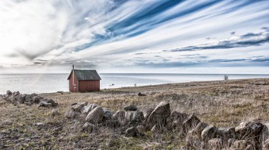 Gotland adasındaki bir balıkçı köyünün ahşap evleri, İsveç, İskandinavya, Avrupa