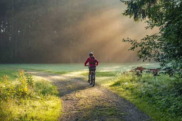 Nice Senior Woman Riding Electrica Mountain Bike Atmosperic Morning Sunrise — Stok fotoğraf