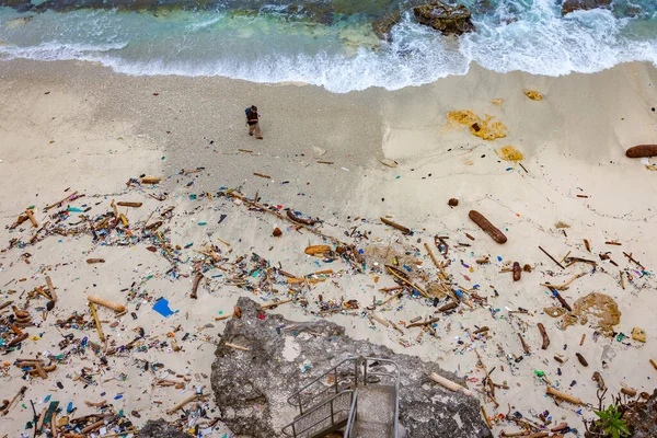 sand beach full of plastic litters on tropic Christmas Island, Indian ocean, Australia,