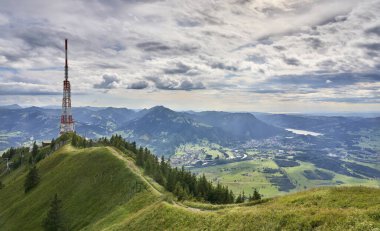 panoramic landscape view from Mount Gruenten over the summits of the Allgaeu alps and Iller valley near Immenstadt, Bavaria, Germany
