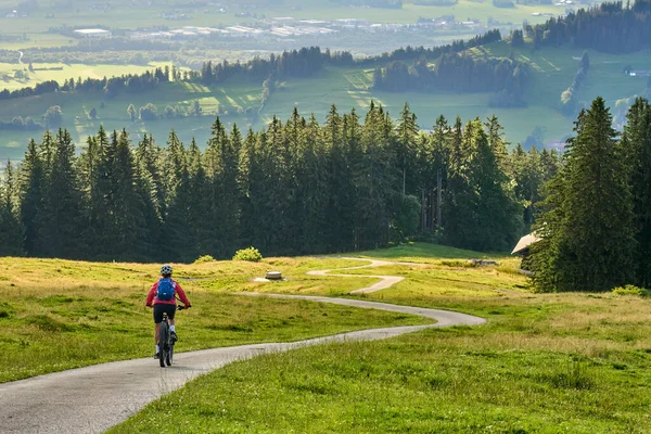 Nice Active Senior Woman Riding Her Electric Mountain Bike Mount — Stock Fotó