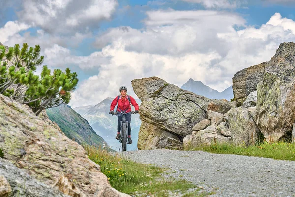 Nice Active Senior Woman Riding Her Electric Mountain Bike Silvretta — 图库照片