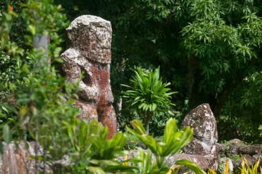 historic stone statues, so called Tikis, on Hiva Oa Island, Marquesas Islands, French Polynesia clipart