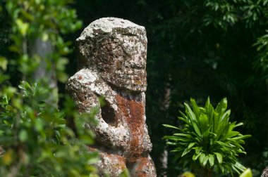 historic stone statues, so called Tikis, on Hiva Oa Island, Marquesas Islands, French Polynesia