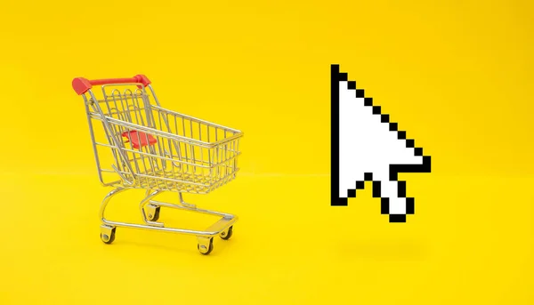 Prázdný Vozík Kurzor Myši Žlutém Povrchu Koncept Nakupování Online — Stock fotografie