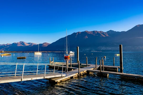 Jetty with a beautiful mountain panorama - Locarno, Switzerland