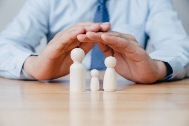Leader of businessman doll standing in front of the follower, business and leadership of manager concept.