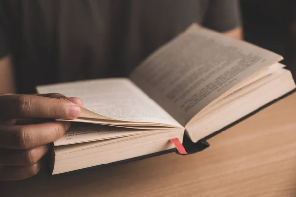 Young Man Reading Book Holy Bible Sharing Gospel Living Room — ストック写真