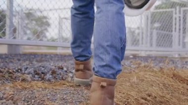 Engineer walk around solar cells station for checking system and maintenance solar panel, Green energy and sustainable environment concept.