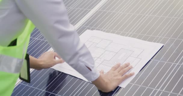 Engineer Open Blueprint Solar Farm Project Solar Cells Panel Summary — Vídeo de Stock