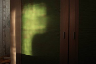 reflection of sunlight with wooden furniture