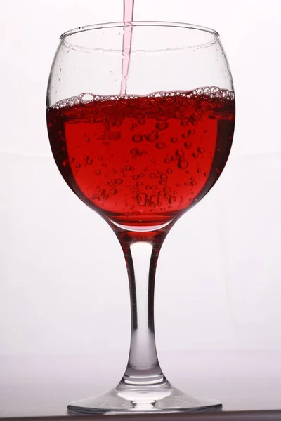 Red Wine Pours Glass — Stock Photo, Image