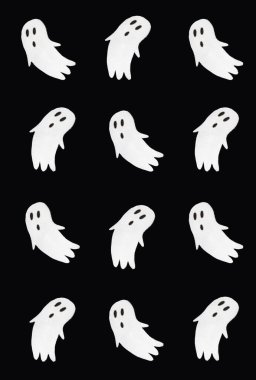 Horror pattern made of ghosts on black background. Minimal spooky idea. Halloween or Santa Muerte concept.