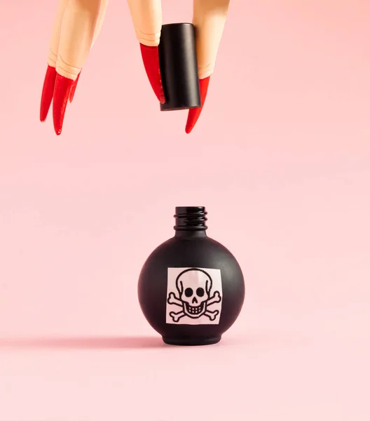 Witch Hand Red Nails Poison Black Bottle Pastel Pink Background — ストック写真