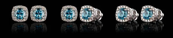 배경에 아콰마린 다이아몬드가 아름다운 금귀고리 — 스톡 사진