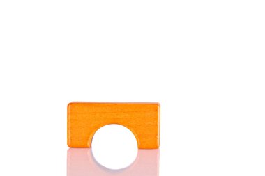 Wooden orange color on a white background close-up