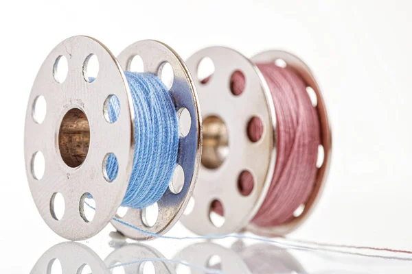 Spools Blue Pink Thread White Background Close — Stock Photo, Image