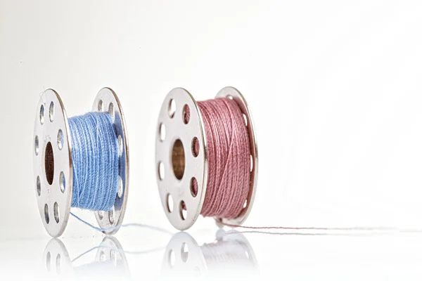 Spools Blue Pink Thread White Background Close — Stock Photo, Image