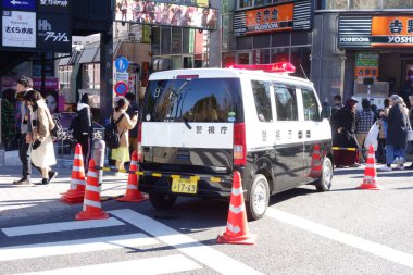 Tokyo Japan, January 03, 2018, Mini Pat to guard the New Year at the entrance of the world-famous Harajuku Takeshita Street