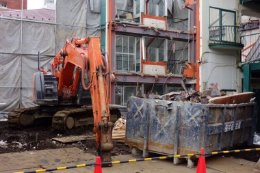 Construction site pattern to dismantle and remove old buildings in the city