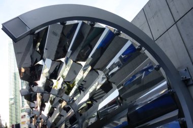 Exotic modern architecture abstract background structure made of metal with reflections