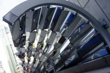 Exotic modern architecture abstract background structure made of metal with reflections