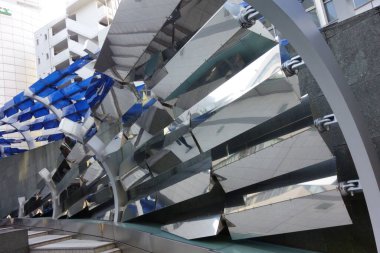 Exotic modern architecture abstract background structure made of metal with reflections