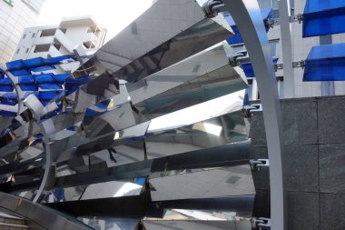 Exotic modern architecture abstract background structure made of metal with reflections