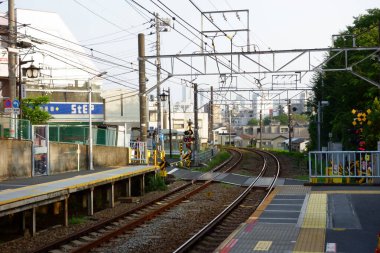 Tokyo, Japan - August 4th, 2018: Tokyo, city train station, tranquil scenery seen from the platform