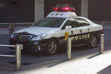 Tokyo, Japan - August 18, 2018: Shibuya, Tokyo, street view of the city with emergency parking of police cars