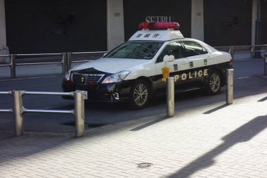 Tokyo, Japan - August 18, 2018: Shibuya, Tokyo, street view of the city with emergency parking of police cars