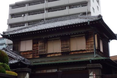 Modern architectural background with old wooden houses in the city of Tokyo Japan