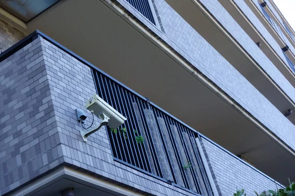 Surveillance camera installed on the outer wall of the building, monitor the state of the street, cctv camera