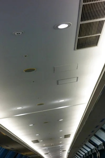Ceiling with a fashionable design for the aisle like the interior of an airport