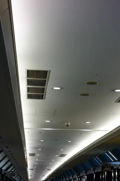 Ceiling with a fashionable design for the aisle like the interior of an airport