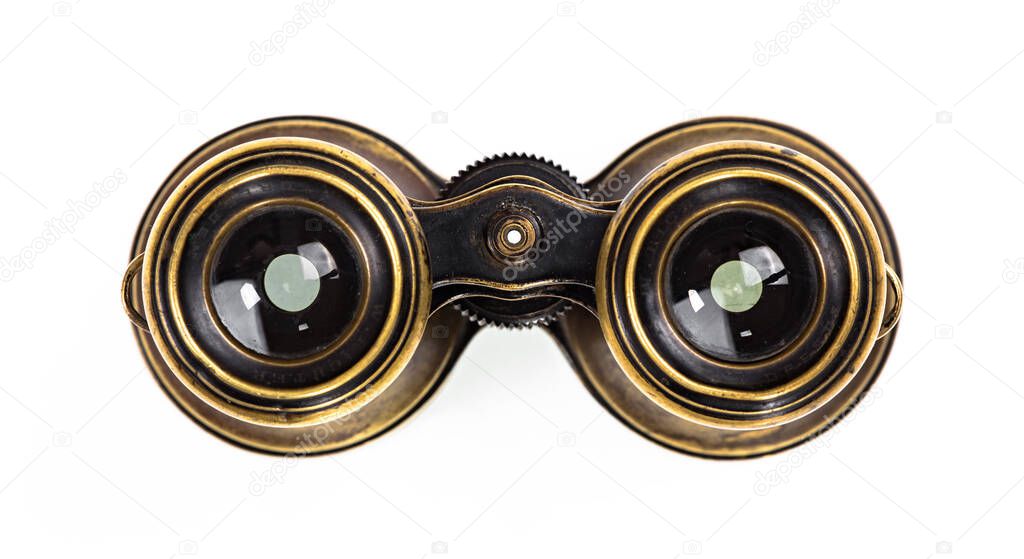 Vintage bronze binoculars on white background
