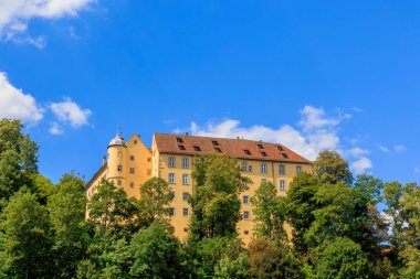 Untergrningen Castle in the Swabian Alb on a sunny day with blue sky.