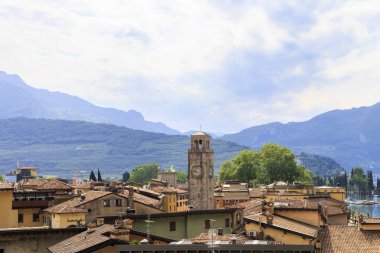 View over the roofs of the Italian town Riva del Garda on Lake Garda with cloudy sky