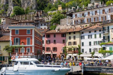 Italy, Limone sul Garda, 2022-05-19, View from a ship on the lake side of the town of Limone on Lake Garda in Italy