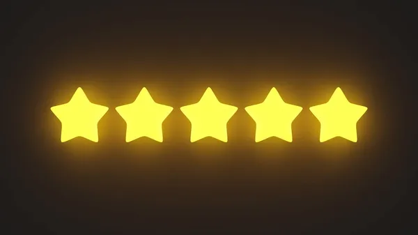Glowing yellow five star rating on a black background. — Stock Photo, Image