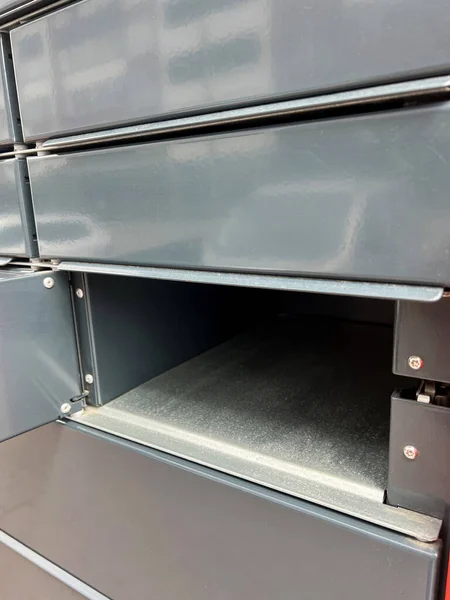 empty mail box. receive order, their purchases over the Internet in a self-service postal machine, open the cell and take parcel. High quality photo