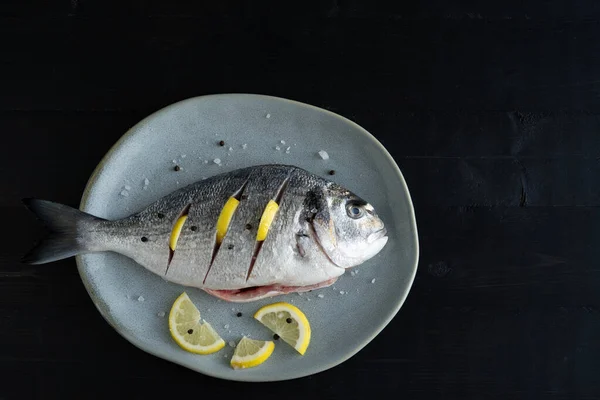 Sparus Aurata Sea Bream Lemon Dark Background Raw Fish Top — Stockfoto
