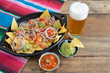 Nachos with meat and guacamole. Mexican food. 
