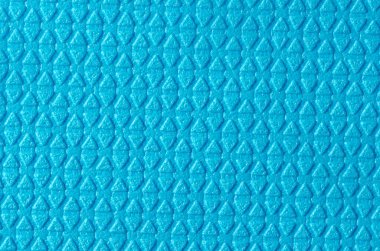 Mavi elmas üçgenlerinin kaba dokusuna sahip arka plan.