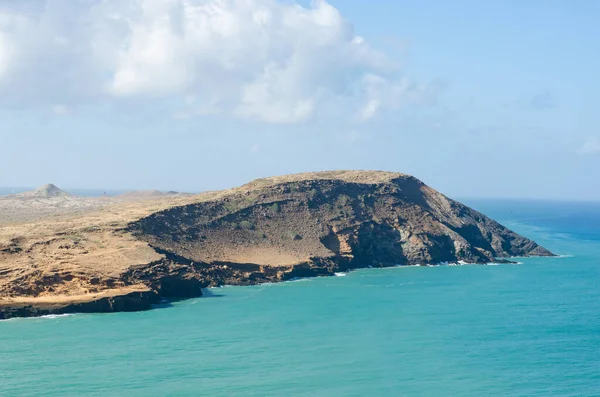 Landscape of the Colombian Caribbean coast in the Guajira desert with sea and land. Copy space.