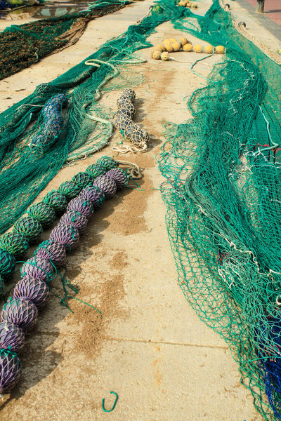 Fishing nets, buoys and ropes in the port of Santa Pola, Alicante, Spain