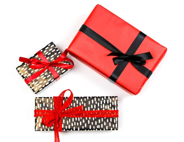 Gifts Wrapped Colorful Paper Red Black Bows White Background — Stock Photo, Image